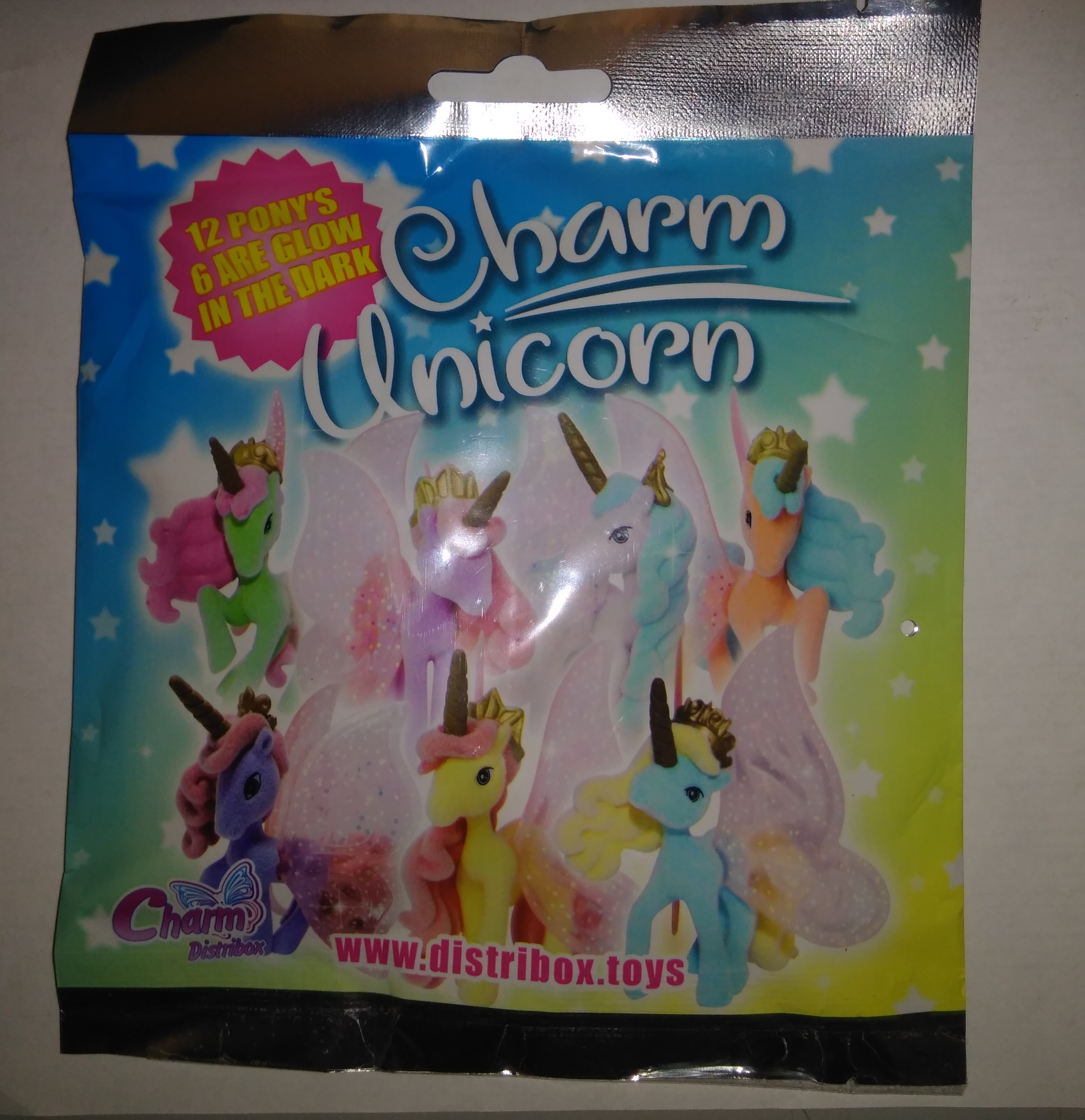 Игрушка в пакетике Маджики  Charm Unicorn  (возможно вскрыта упаковка)